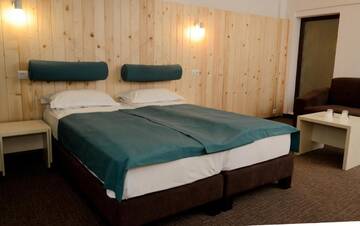 Фото номера Двухместный номер с 1 кроватью Отель Complex Hotelier COTA O MIE г. Синая 6