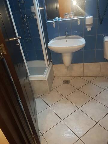 Фото номера Двухместный номер с 2 отдельными кроватями в мансарде Отель Hotel Cristal Sinaia г. Синая 8