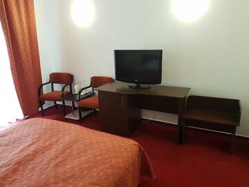 Фото номера Двухместный номер с 1 кроватью или 2 отдельными кроватями Отель Hotel Cristal Sinaia г. Синая 4
