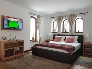 Фото номера Люкс с балконом Гостевой дом Alfinio Villa г. Синая 8