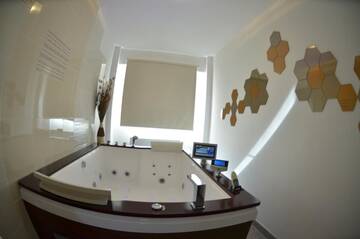 Фото номера Апартаменты Делюкс Апарт-отели Wolfs Haus г. Синая 95