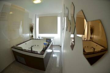 Фото номера Апартаменты Делюкс Апарт-отели Wolfs Haus г. Синая 96