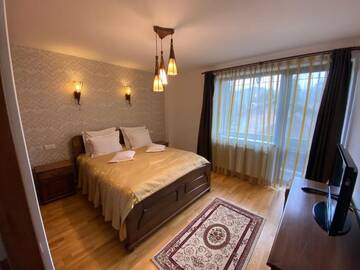 Фото номера Апартаменты с 2 спальнями - первый этаж Гостевой дом Pension Carmen`s Mansion A г. Синая 13