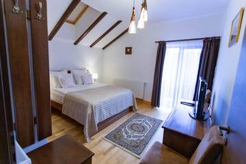 Фото номера Апартаменты с 2 спальнями - Мансарда Гостевой дом Pension Carmen`s Mansion A г. Синая 7