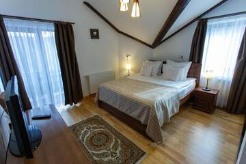 Фото номера Апартаменты с 2 спальнями - Мансарда Гостевой дом Pension Carmen`s Mansion A г. Синая 3