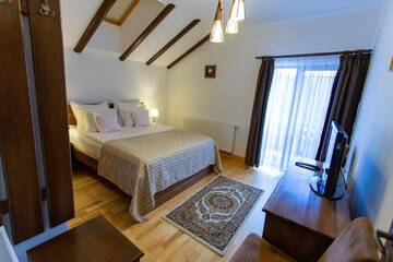 Фото номера Апартаменты с 2 спальнями - Мансарда Гостевой дом Pension Carmen`s Mansion A г. Синая 5